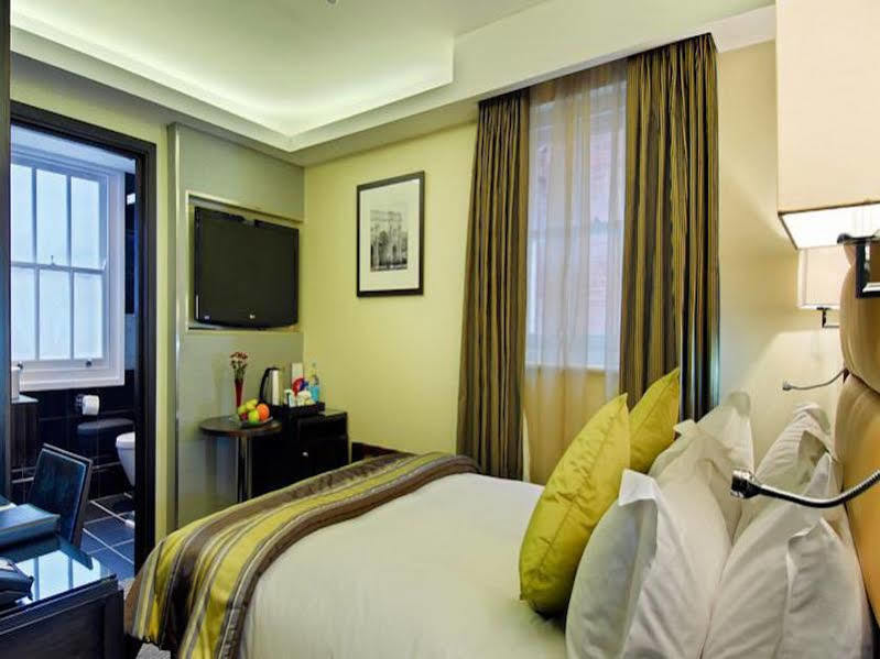 Park Grand Mayfair Лондон Экстерьер фото A room at the hotel
